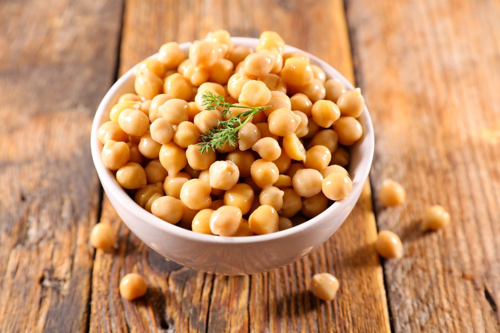 A bowl of chickpeas with parsley