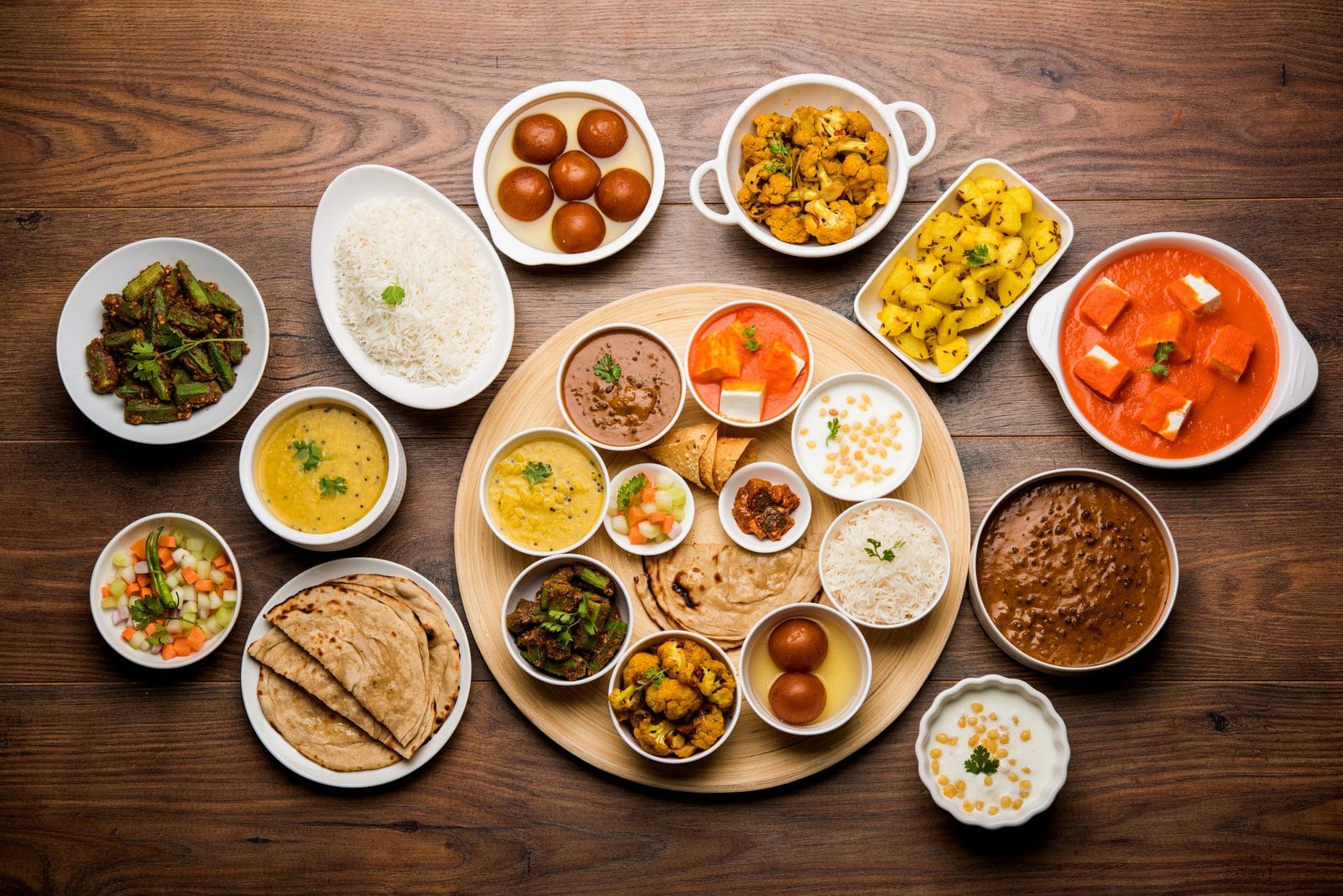 An Indian vegetarian thali served with flatbread