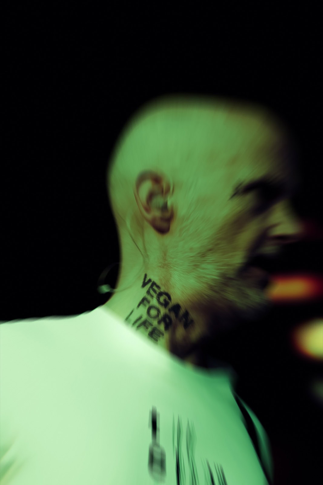 Moby in profile with his vegan for life neck tattoo, photographed by Ninon Soulié