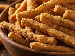 A bowl of knobbly Twiglets snacks