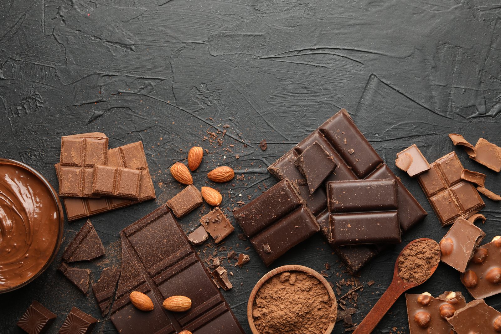 A dark chocolate bar with almonds