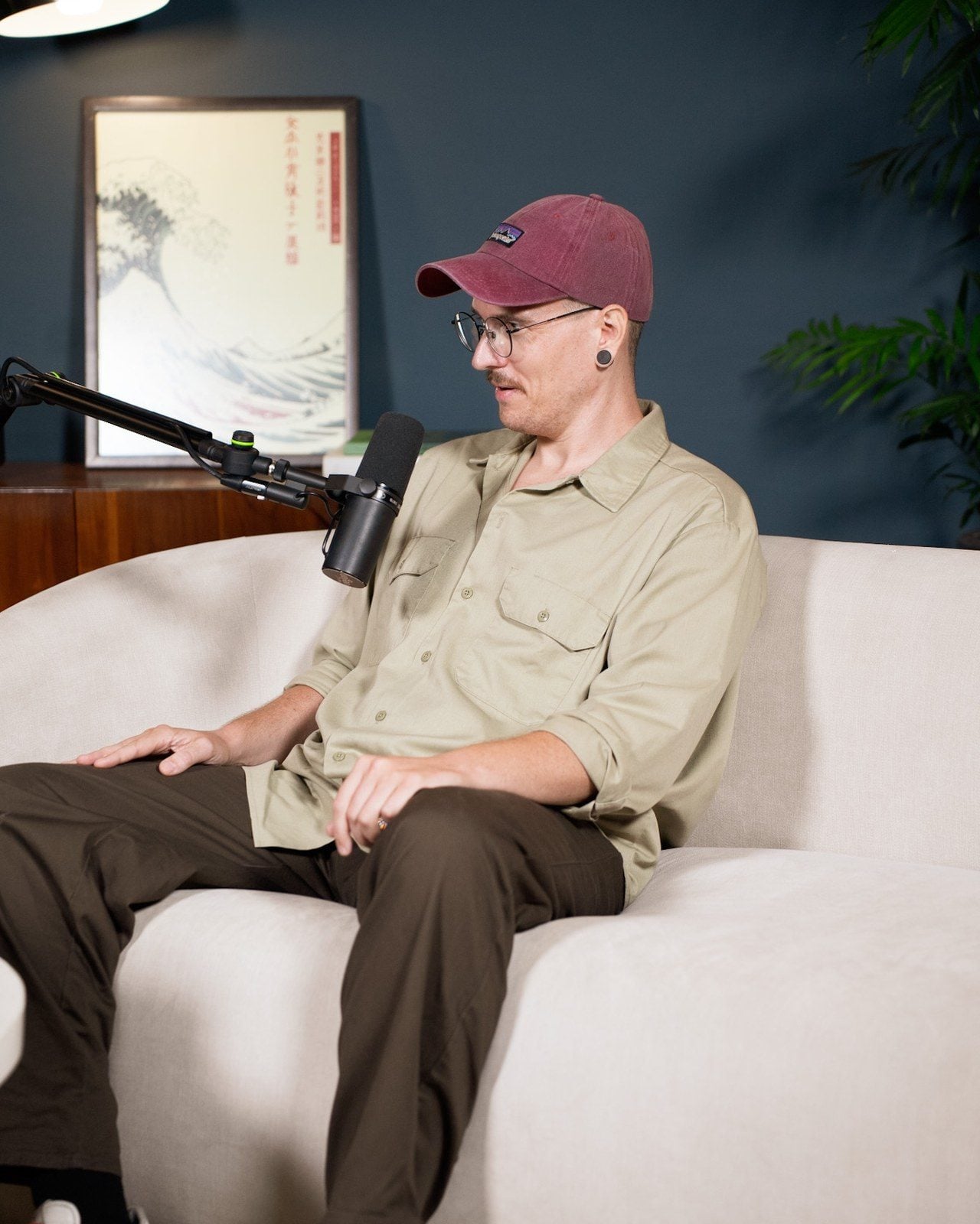 Yannick Haldenwanger asking a question in the podcast studio